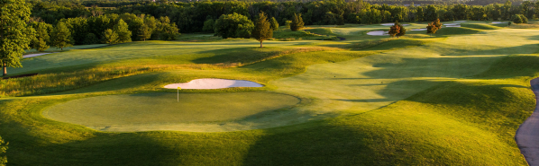 view of golf course hole with bunkers